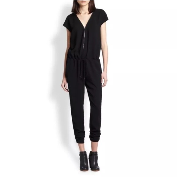black jumpsuit with zipper in front